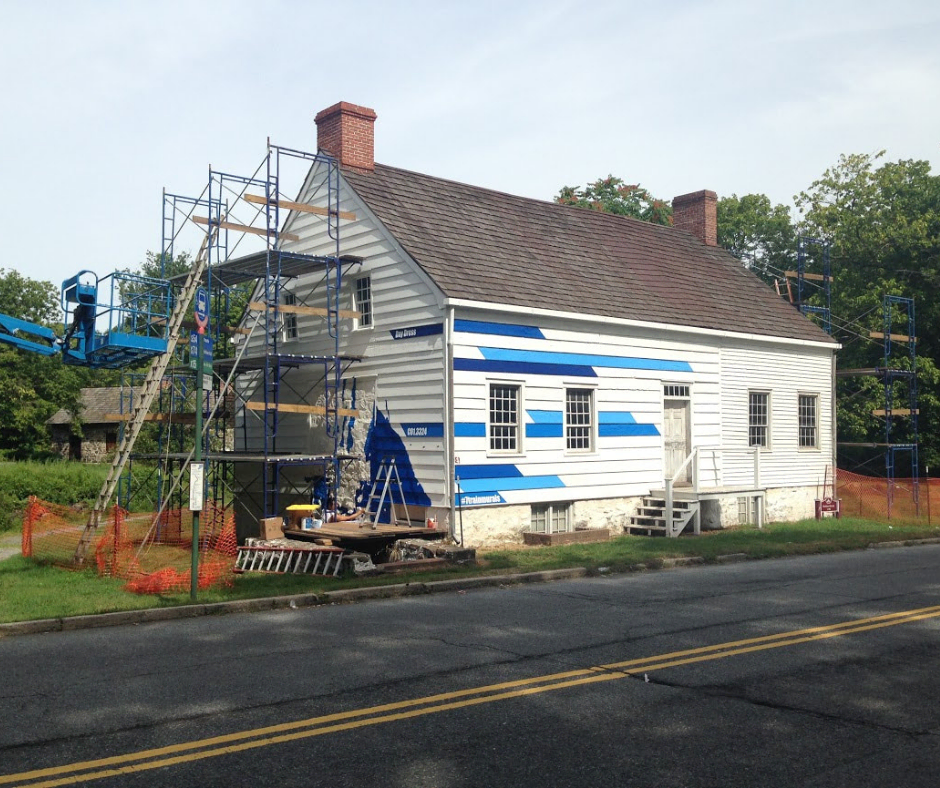 Historic house being painted