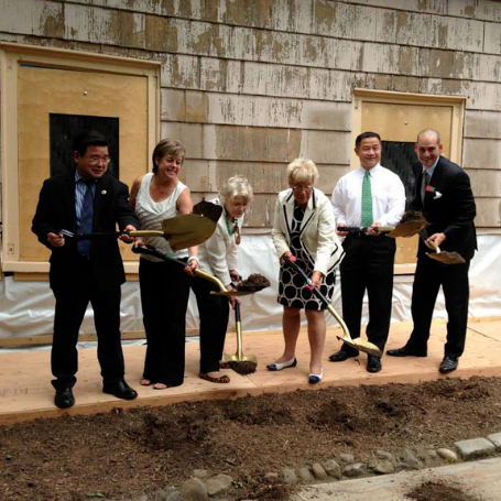 6 people breaking ground on historic house restoration