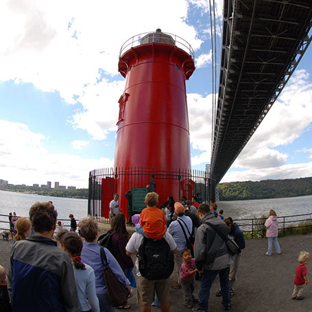 Visitors gathering at the Little Red Lighthouse
